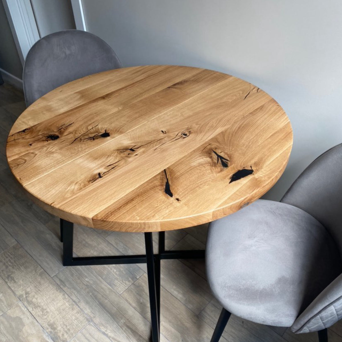 Round Extendable Oak Dining Table with Metal Base