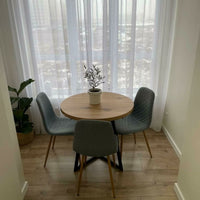 Round Extendable Oak Dining Table with Metal Base